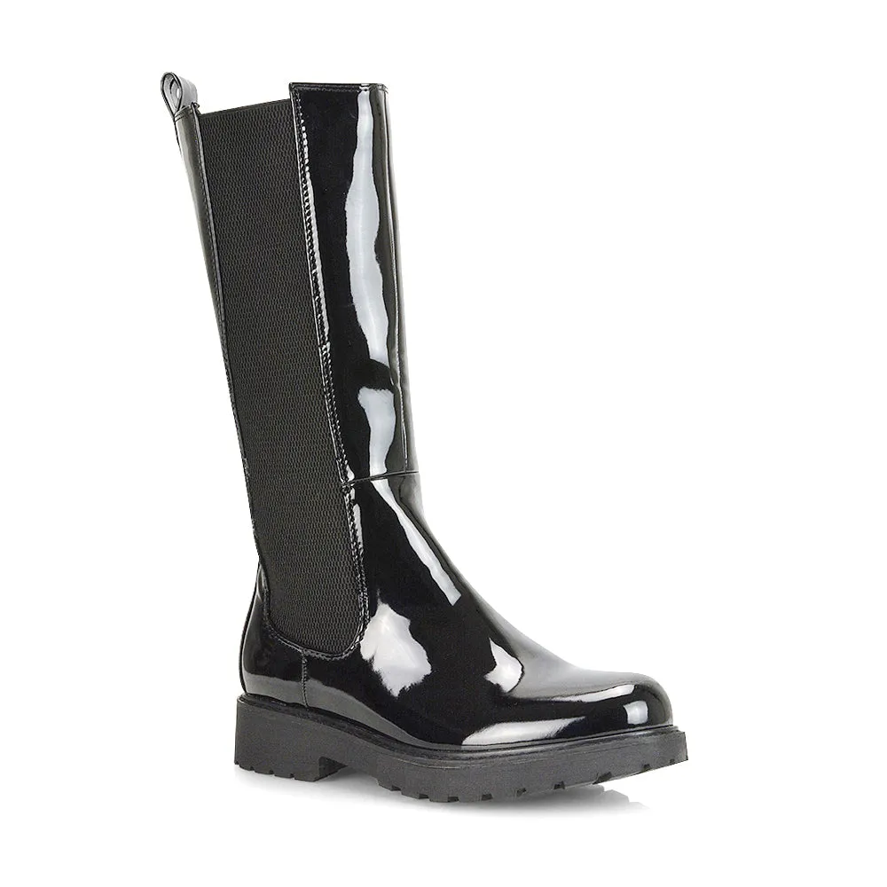 Suzie Flat Low Block Heel Slip on below the Knee Biker Boots in Black Patent