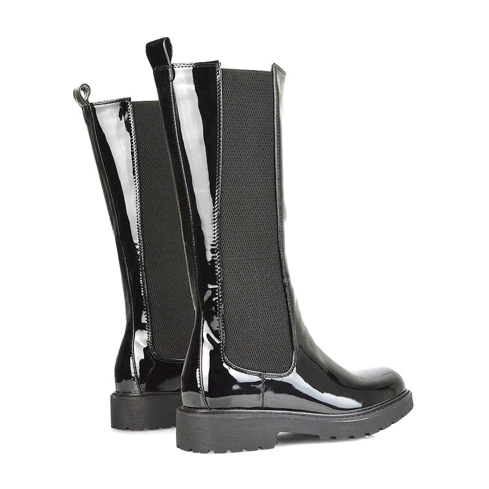 Suzie Flat Low Block Heel Slip on below the Knee Biker Boots in Black Patent