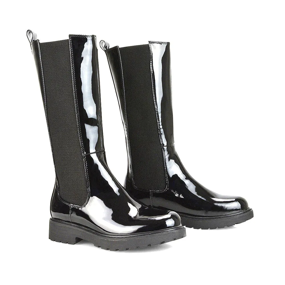 Suzie Flat Low Block Heel Slip on below the Knee Biker Boots in Black Patent